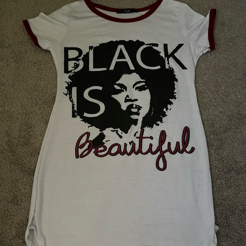 T-shirt reading "Black Is Beautiful"